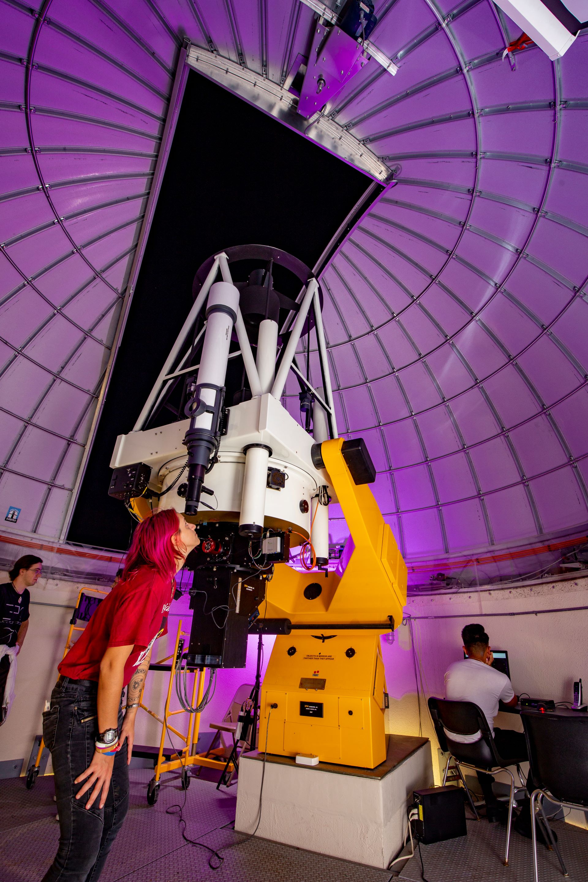 Upward view from the staircase in a hallway